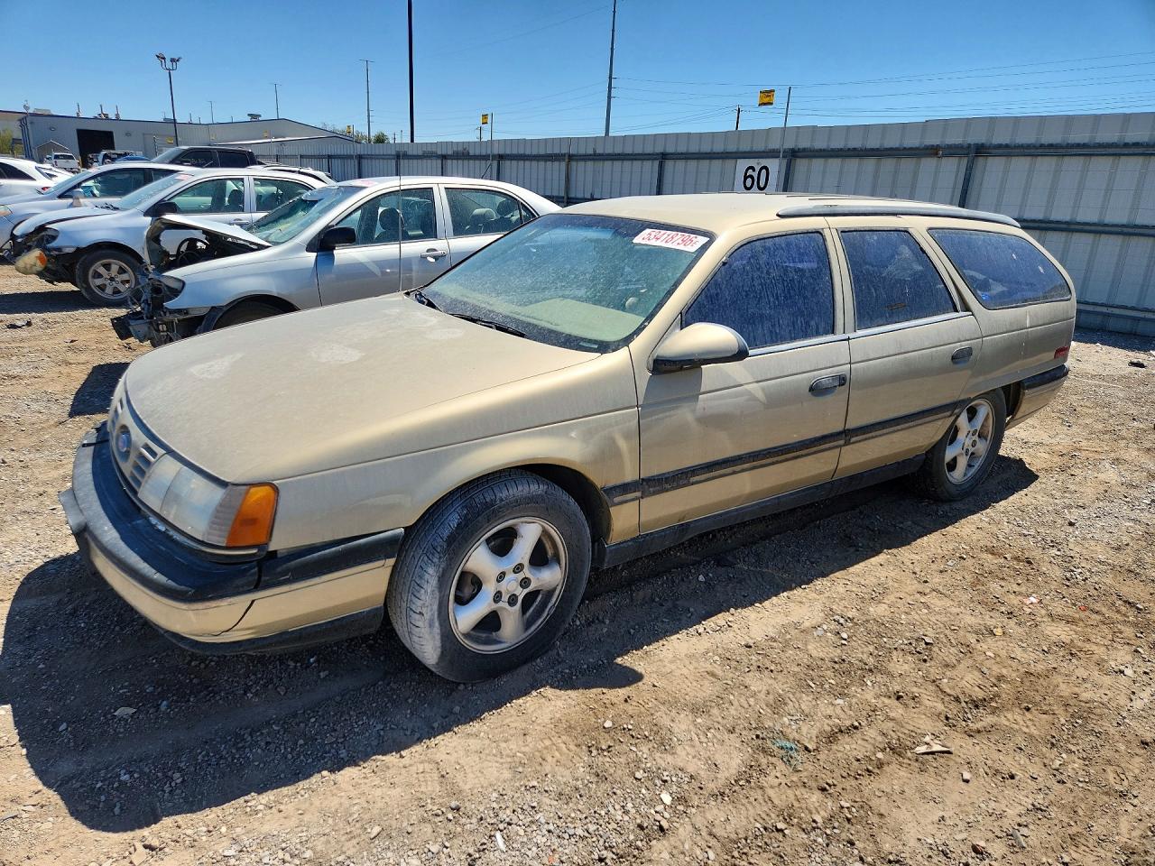 1990 Ford Taurus, VIN 1FACP5745LG254707 — Пожар