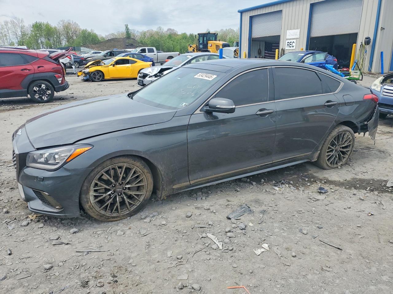 2019 Genesis G80 3.8L, VIN KMTFN4JE9KU320640 — Side