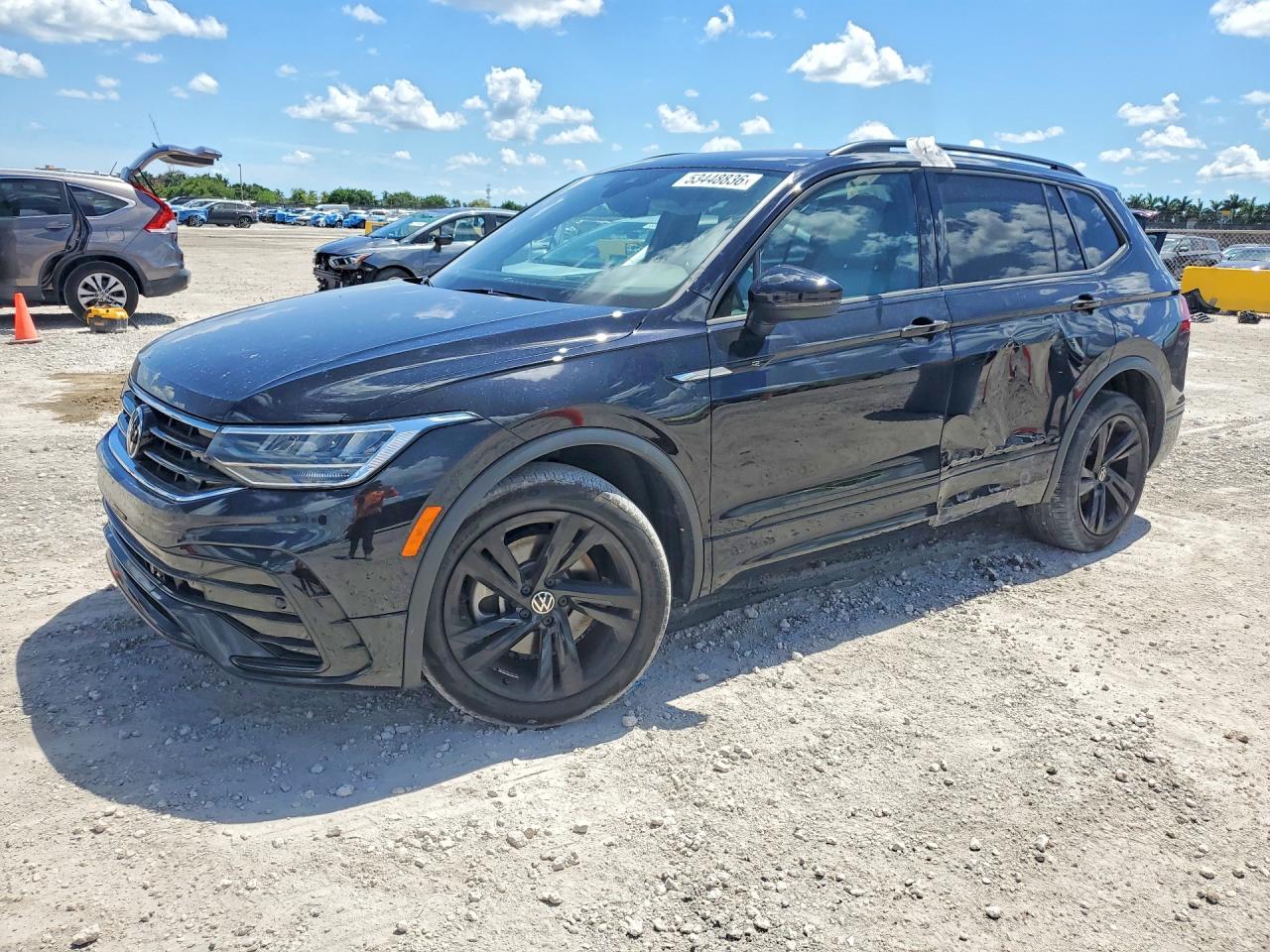 2023 Volkswagen Tiguan SE R-Line Black, VIN 3VVCB7AX3PM118693 — Side