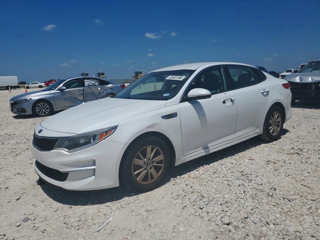 2018 Kia Optima LX, VIN 5XXGT4L38JG193033 — Vandalism
