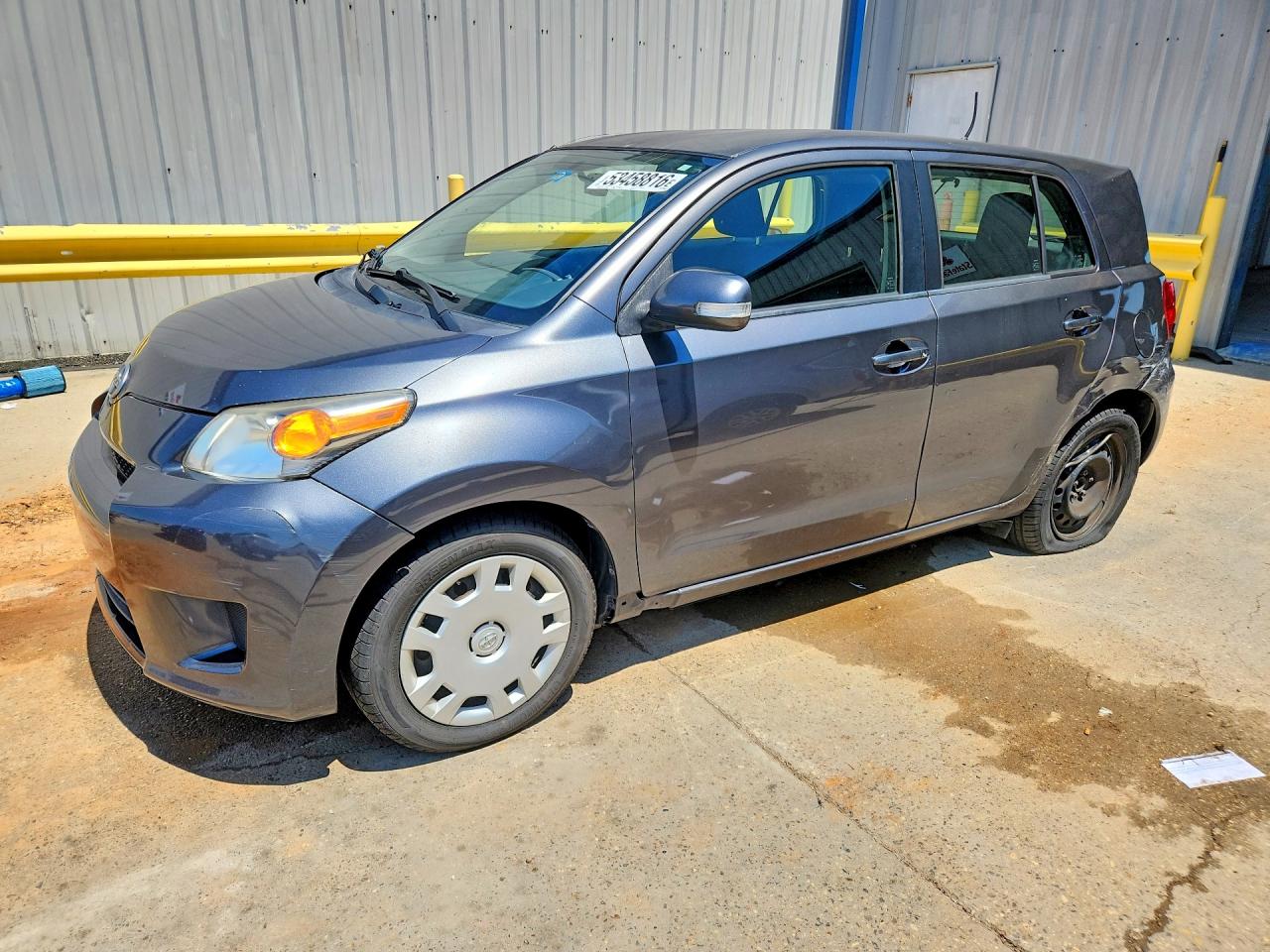 2014 Scion xD, VIN JTKKUPB40E1041874 — Rear end
