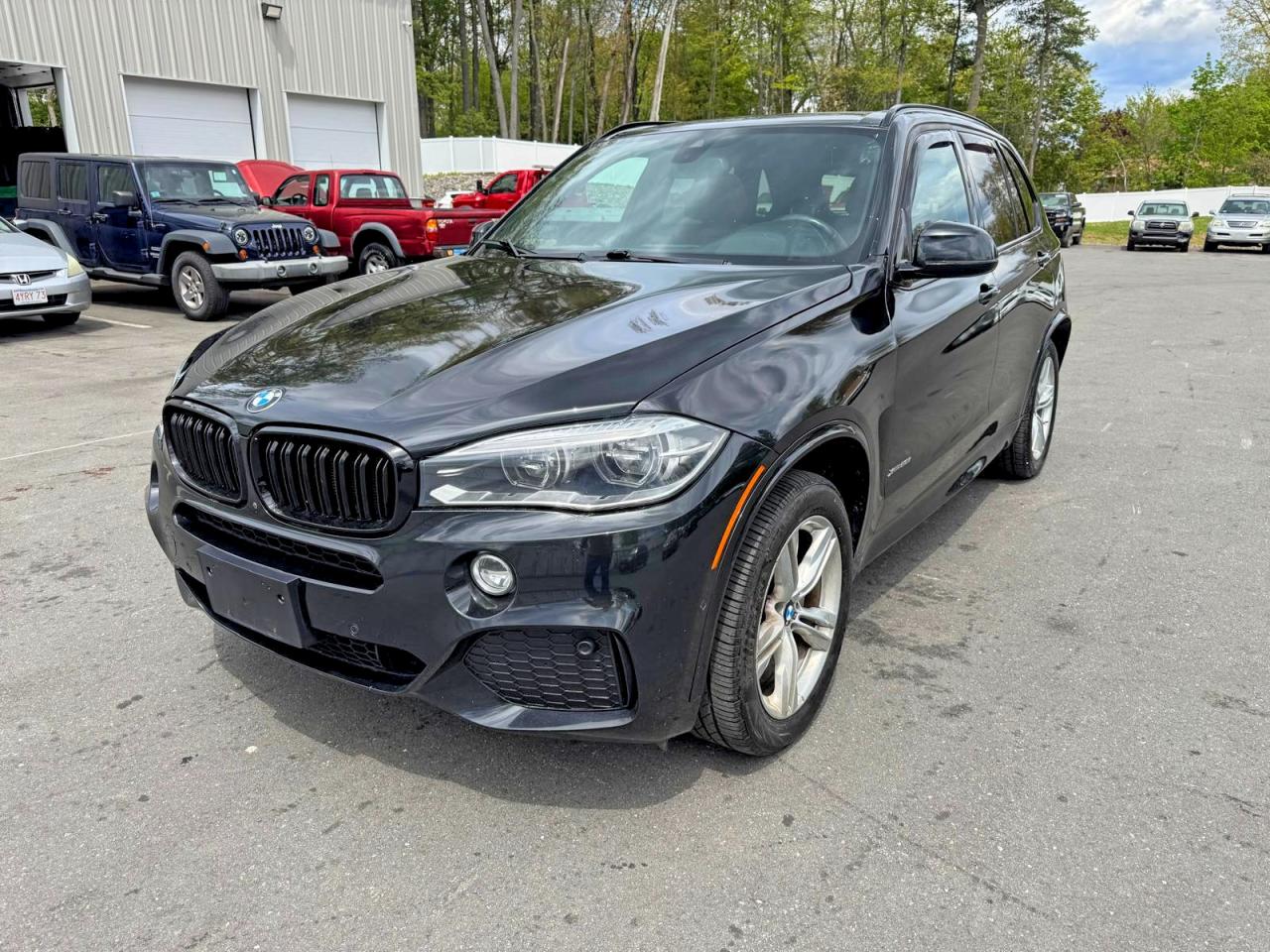 2015 BMW X5 xDrive50i, VIN 5UXKR6C54F0J74895 — Minor dents and scratches