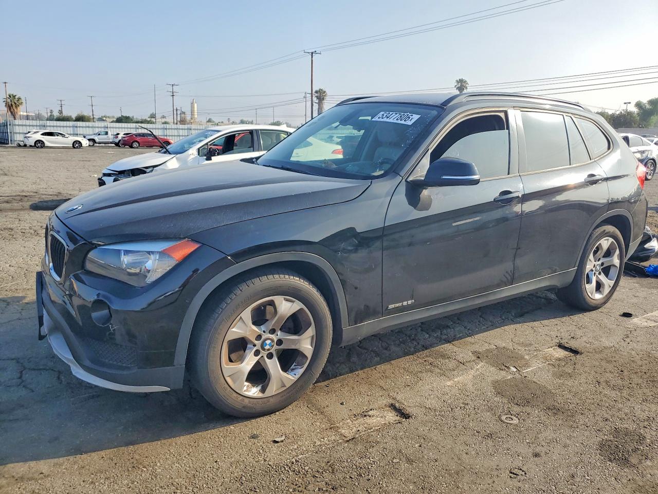 2015 BMW X1 sDrive28i, VIN WBAVM1C51FV316023 — Minor dents and scratches