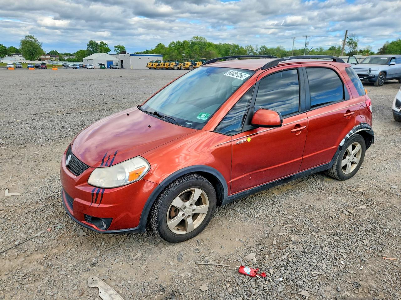 2012 Suzuki SX4 Crossover, VIN JS2YB5A33C6307317 — Side