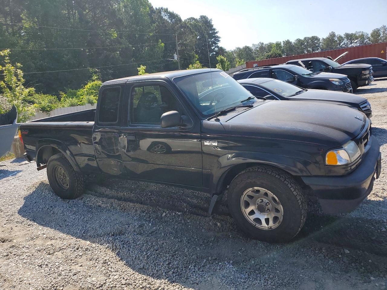 2001 Mazda B-Series DS, VIN 4F4YR16V91TM27928 — Бок