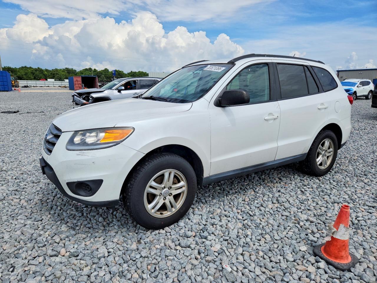 2012 Hyundai Santa Fe GLS, VIN 5XYZGDAB8CG097795 — Minor dents and scratches