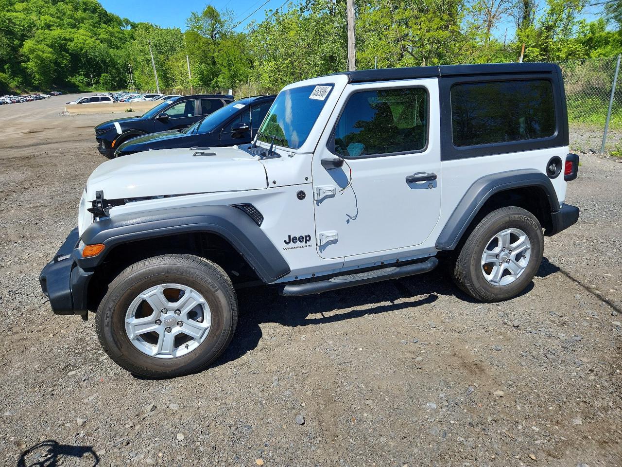 2023 Jeep Wrangler Sport, VIN 1C4HJXAG8PW558660 — Front end