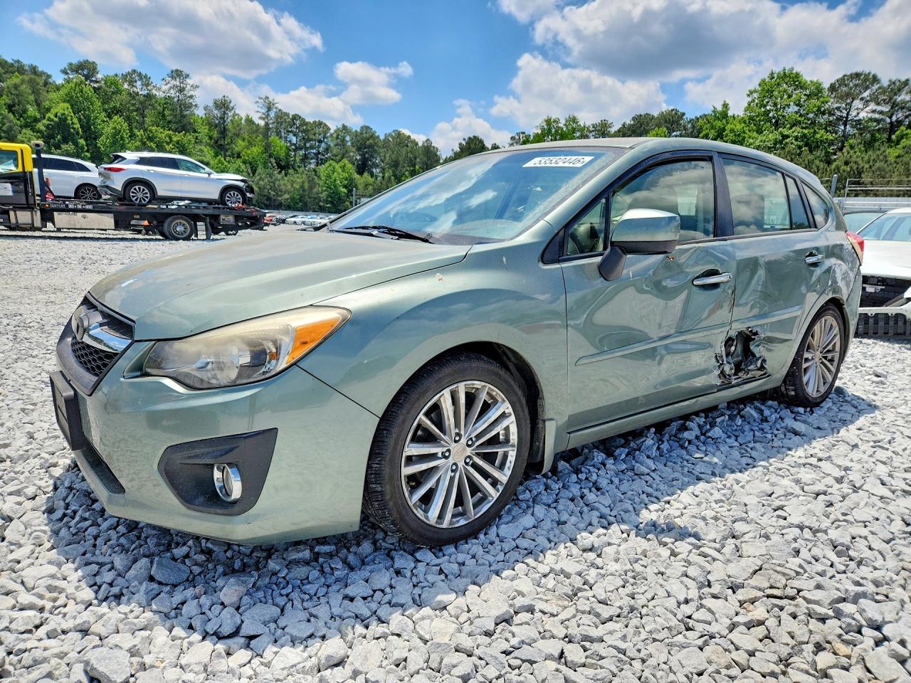 2014 Subaru Impreza Limited, VIN JF1GPAH60E8308292 — Side