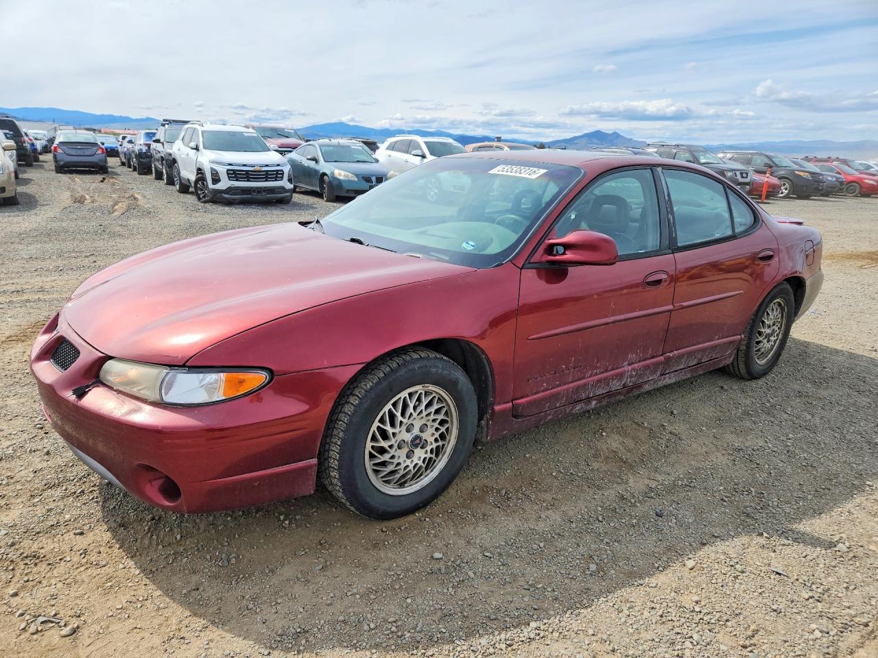 2000 Pontiac Grand Prix GT, VIN 1G2WP52K4YF219459 — Side