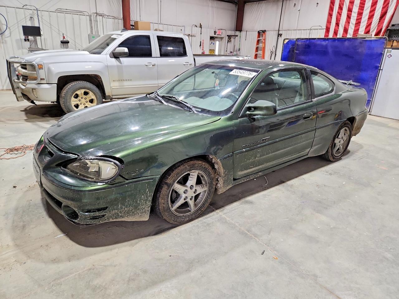 2000 Pontiac Grand Am GT1, VIN 1G2NV12E2YM717630 — Side