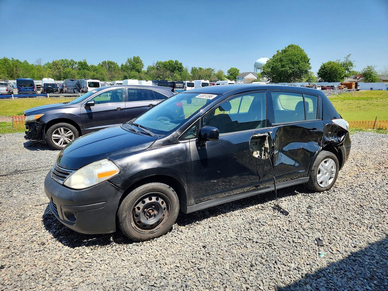2011 Nissan Versa S, VIN 3N1BC1CP3BL502220 — Side