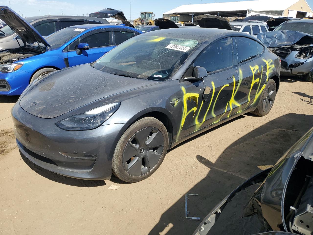 2023 Tesla Model 3 Long Range, VIN 5YJ3E1EB1PF688455 — Vandalism