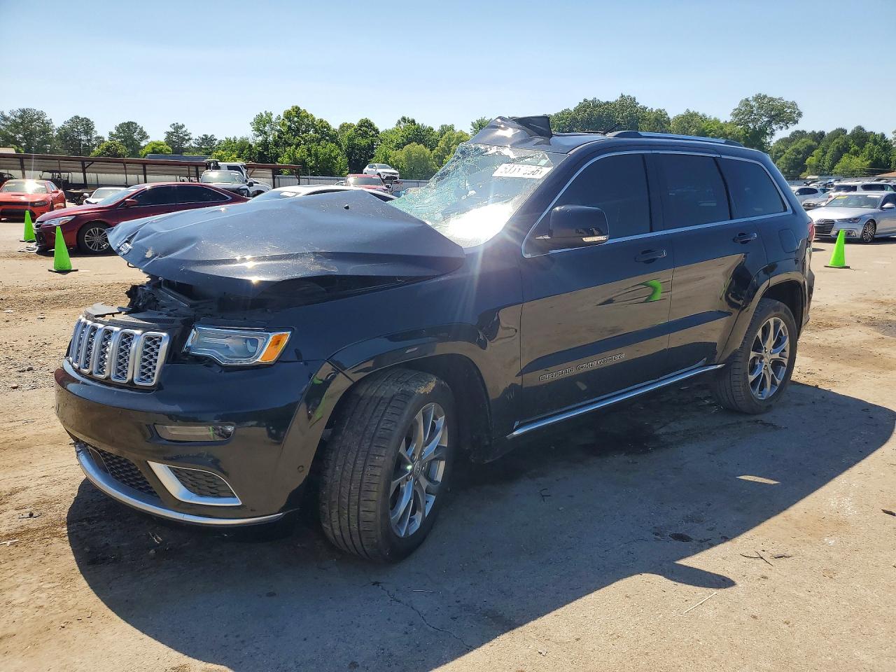 2021 Jeep Grand Cherokee Summit, VIN 1C4RJEJG9MC570127 — Side