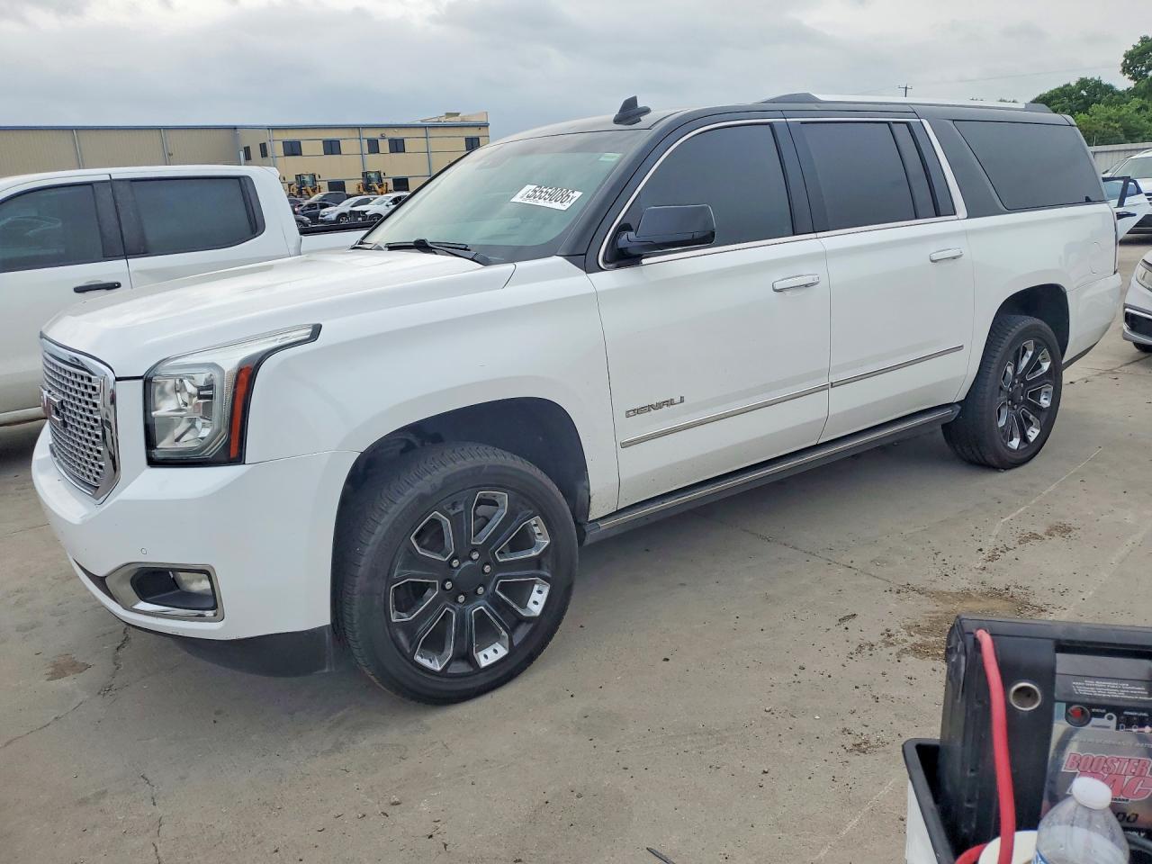 2016 GMC Yukon XL Denali, VIN 1GKS1HKJ1GR319251 — Hail