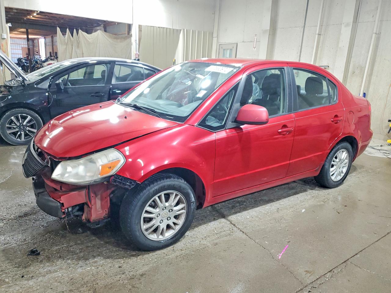 2012 Suzuki SX4 LE, VIN JS2YC5A33C6304088 — Front end