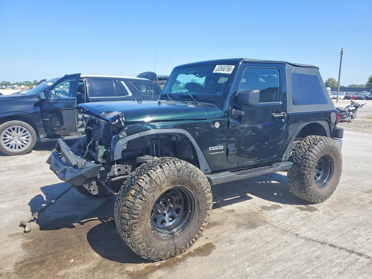 2012 Jeep Wrangler Sport, VIN 1C4AJWAG6CL192205 — Front end