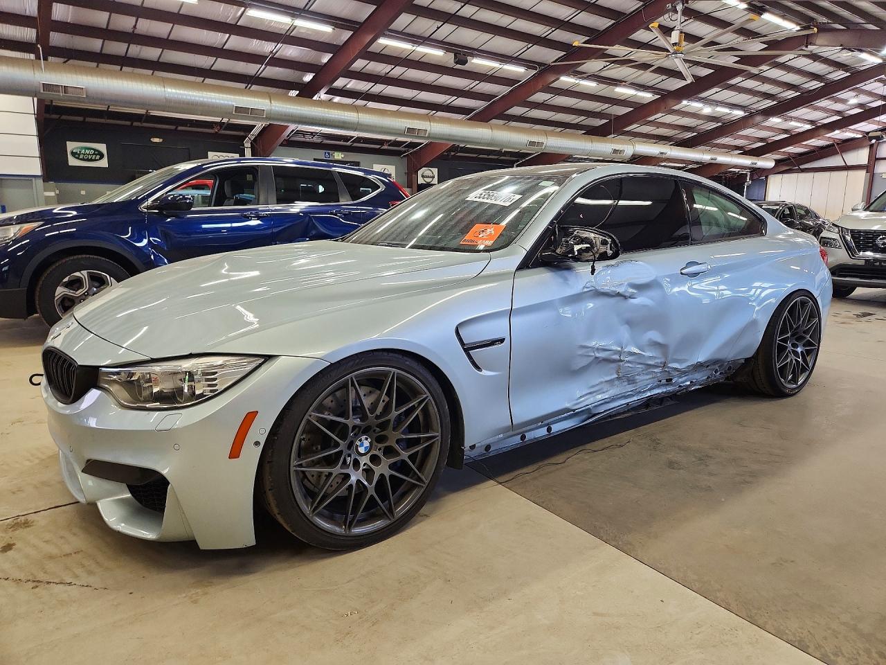 2017 BMW M4, VIN WBS3R9C58HK709122 — Side