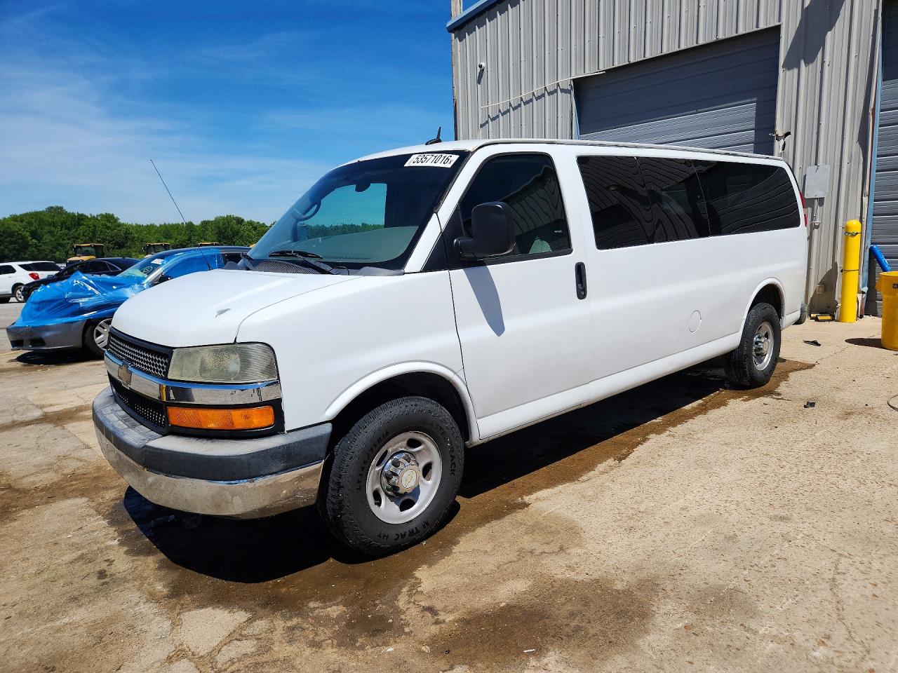 2013 Chevrolet Express Passenger LT, VIN 1GAZG1FG1D1145215 — Normal wear