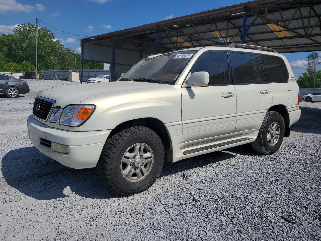 1999 Lexus LX 470, VIN JT6HT00WXX0043065 — Roof