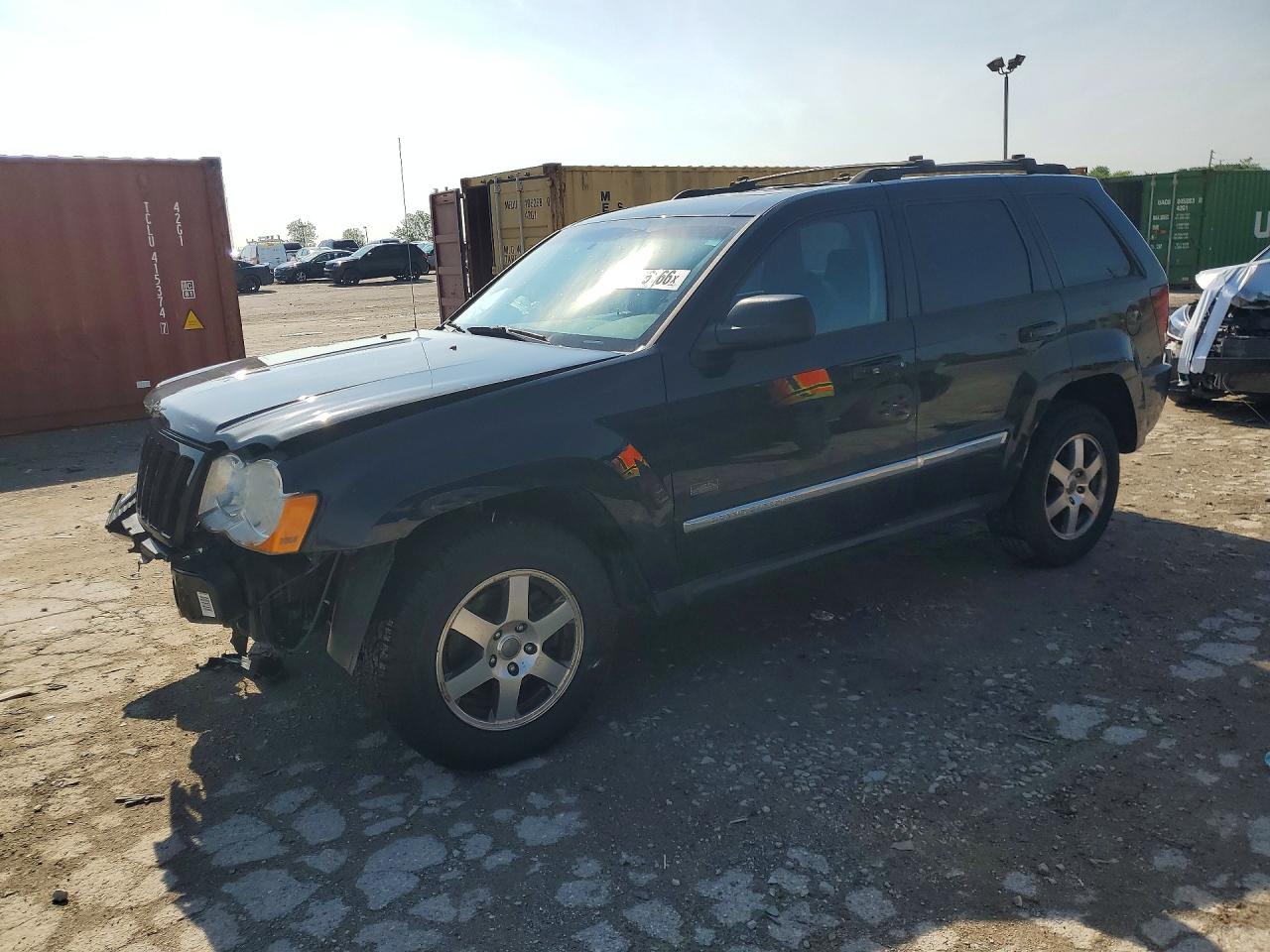 2009 Jeep Grand Cherokee Rocky Mountain, VIN 1J8GR48K29C553383 — Front end