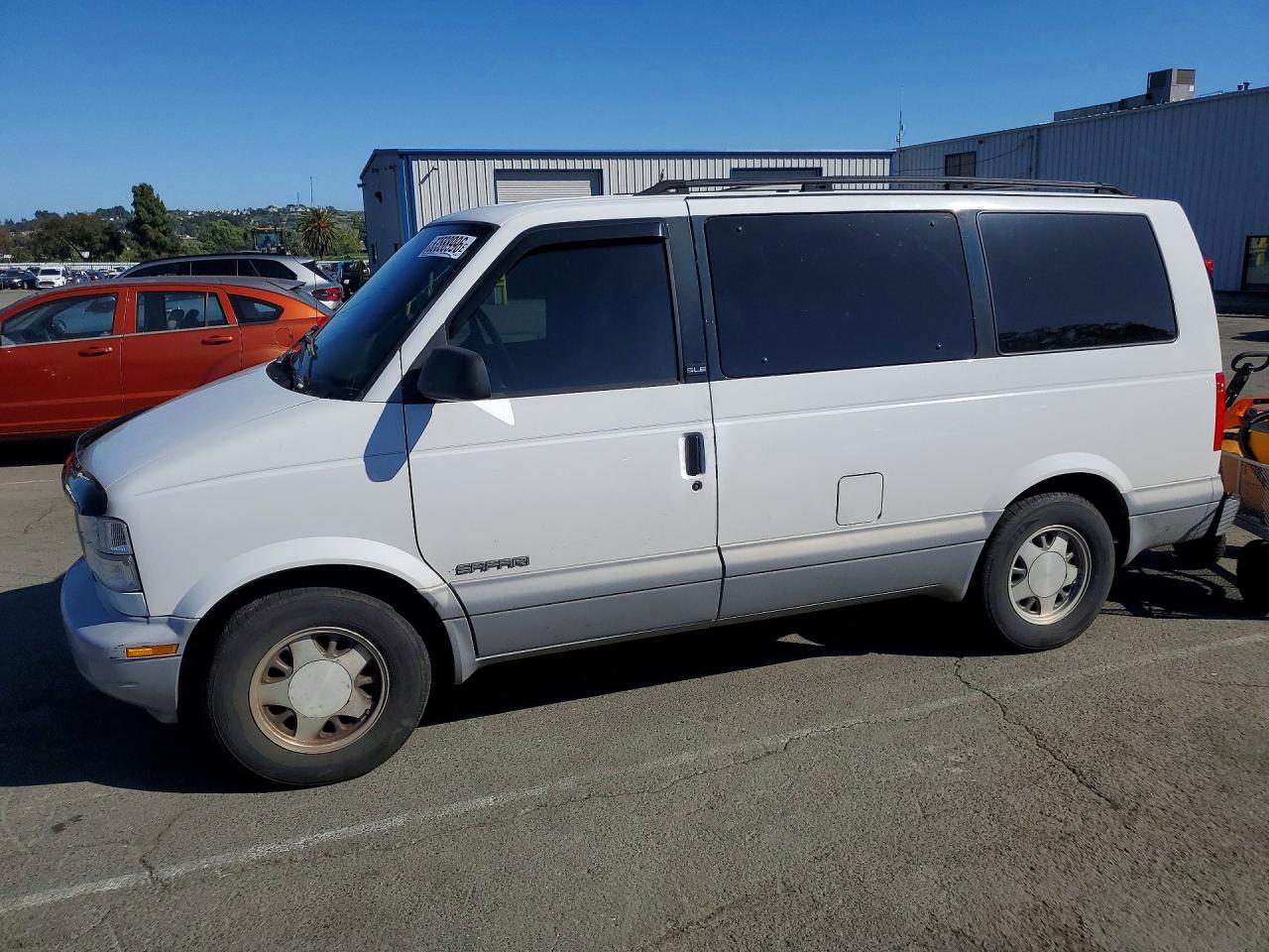 1997 GMC Safari, VIN 1GKDM19W9VB505022 — Minor dents and scratches