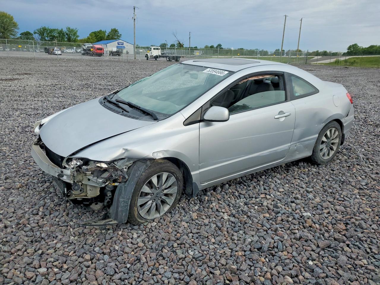 2009 Honda Civic EX, VIN 2HGFG12869H520602 — Rollover