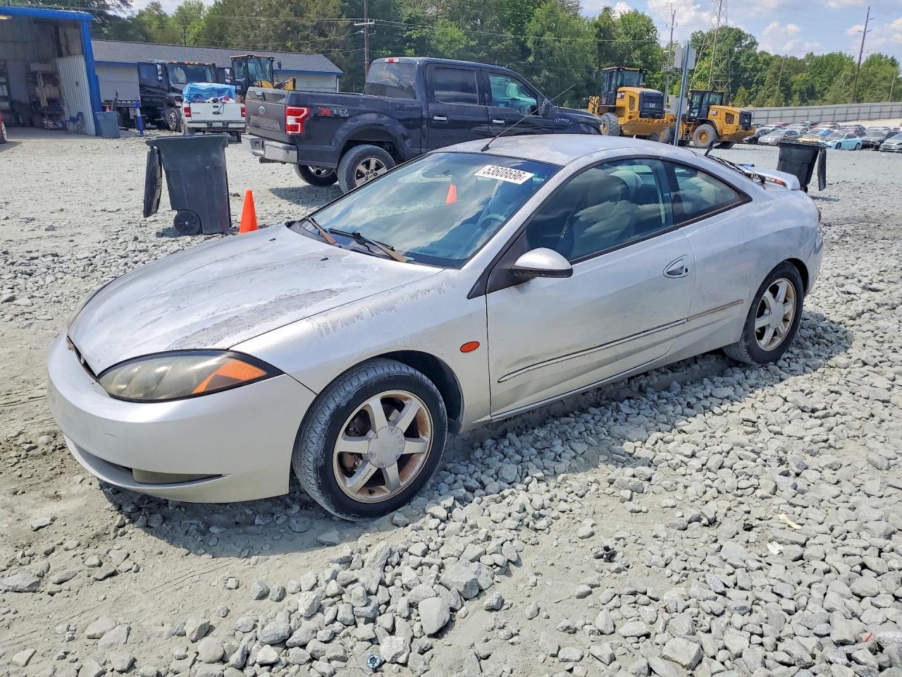 1999 Mercury Cougar, VIN 1ZWFT61L3X5656258 — Minor dents and scratches