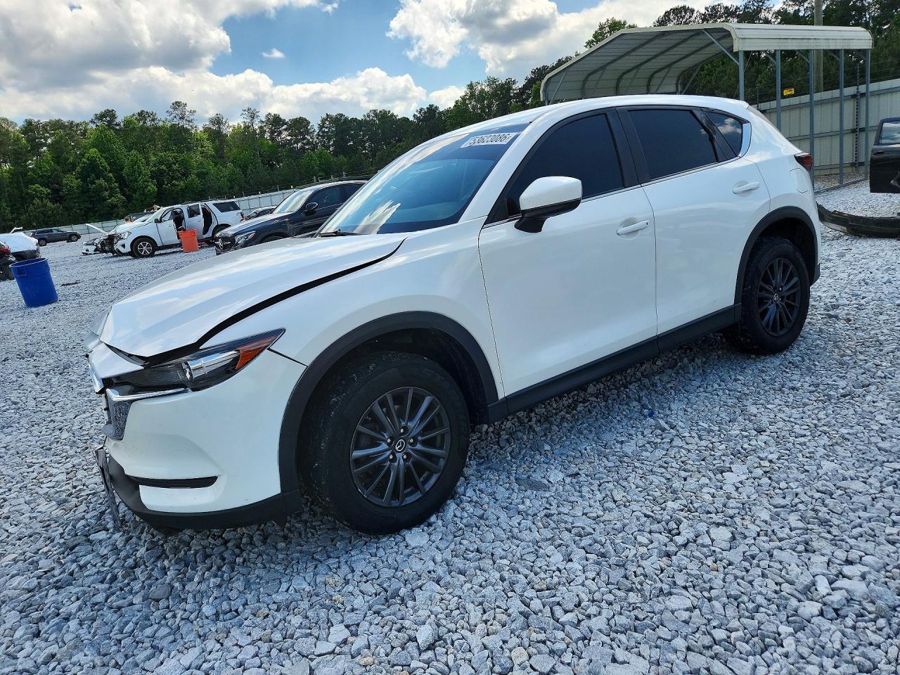 2020 Mazda CX-5 Sport, VIN JM3KFABM7L1821857 — Зад