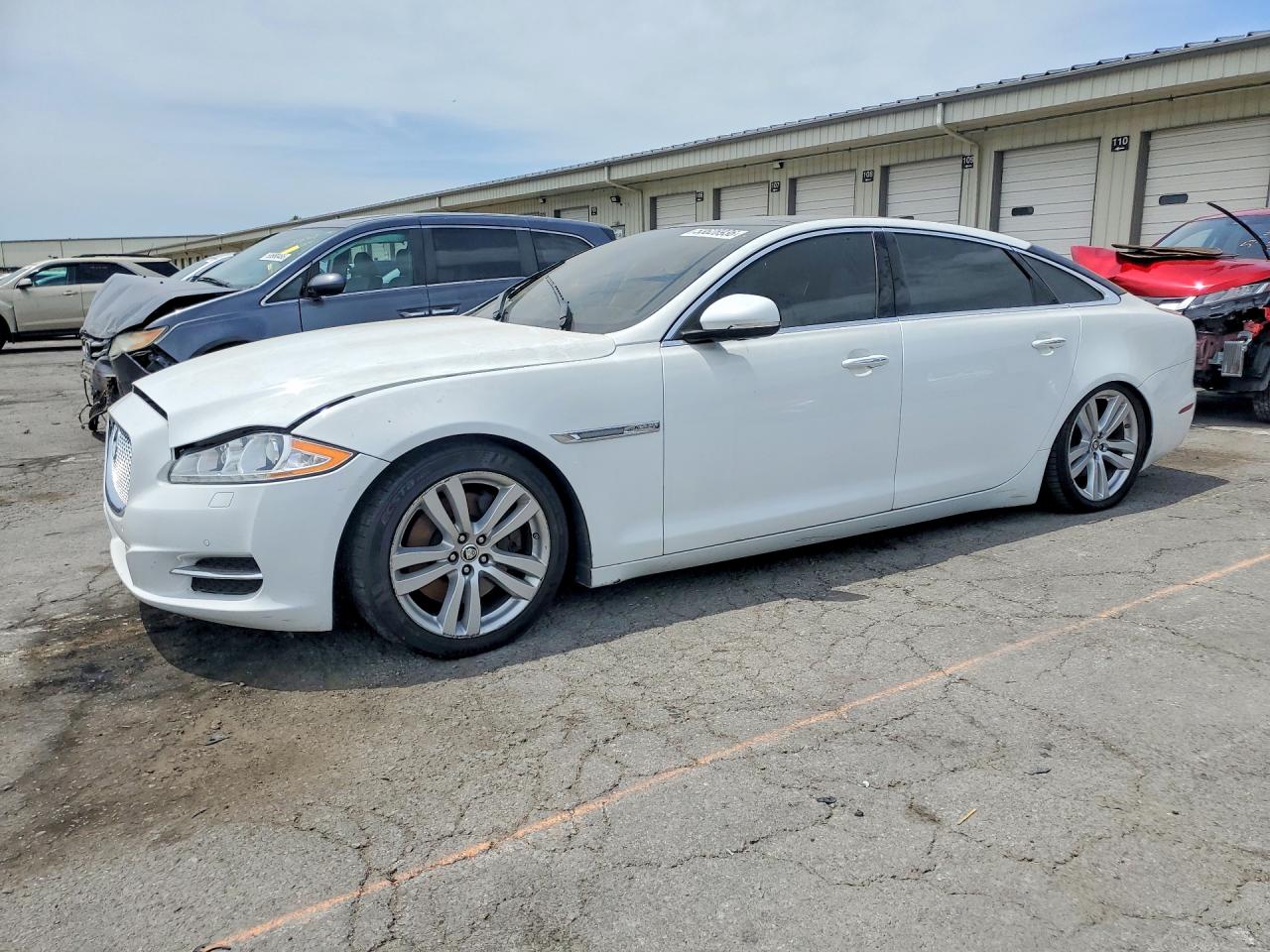 2013 Jaguar XJ Portfolio, VIN SAJWA2G10DLV53383 — Side