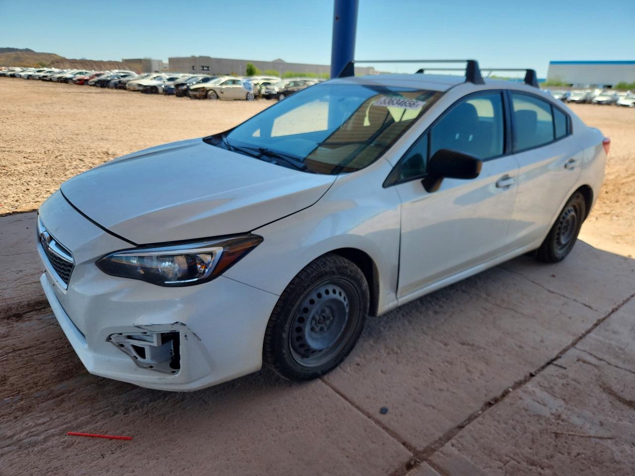 2017 Subaru Impreza, VIN 4S3GKAA60H3623405 — Side