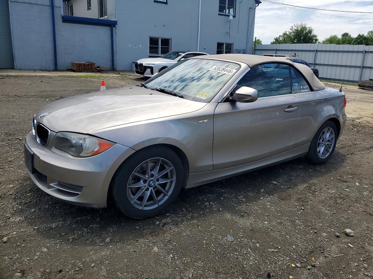 2011 BMW 1 Series 128i, VIN WBAUN1C57BVH83730 — Side