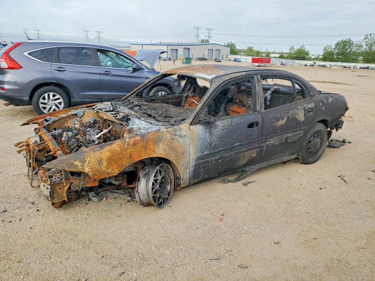 2002 Buick LeSabre Limited, VIN 1G4HR54KX2U238222 — Burn
