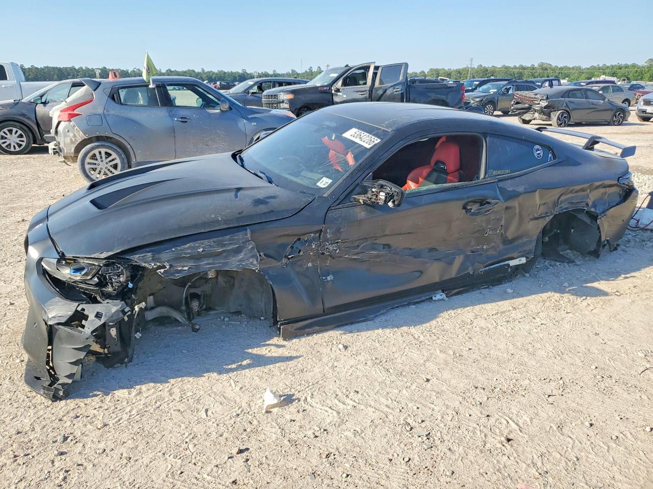 2022 BMW M4 Competition xDrive, VIN WBS43AZ03NCK05537 — Side