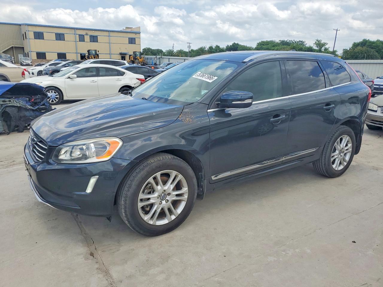 2015 Volvo XC60 T5 Drive-E Premier, VIN YV440MDK2F2669207 — Hail