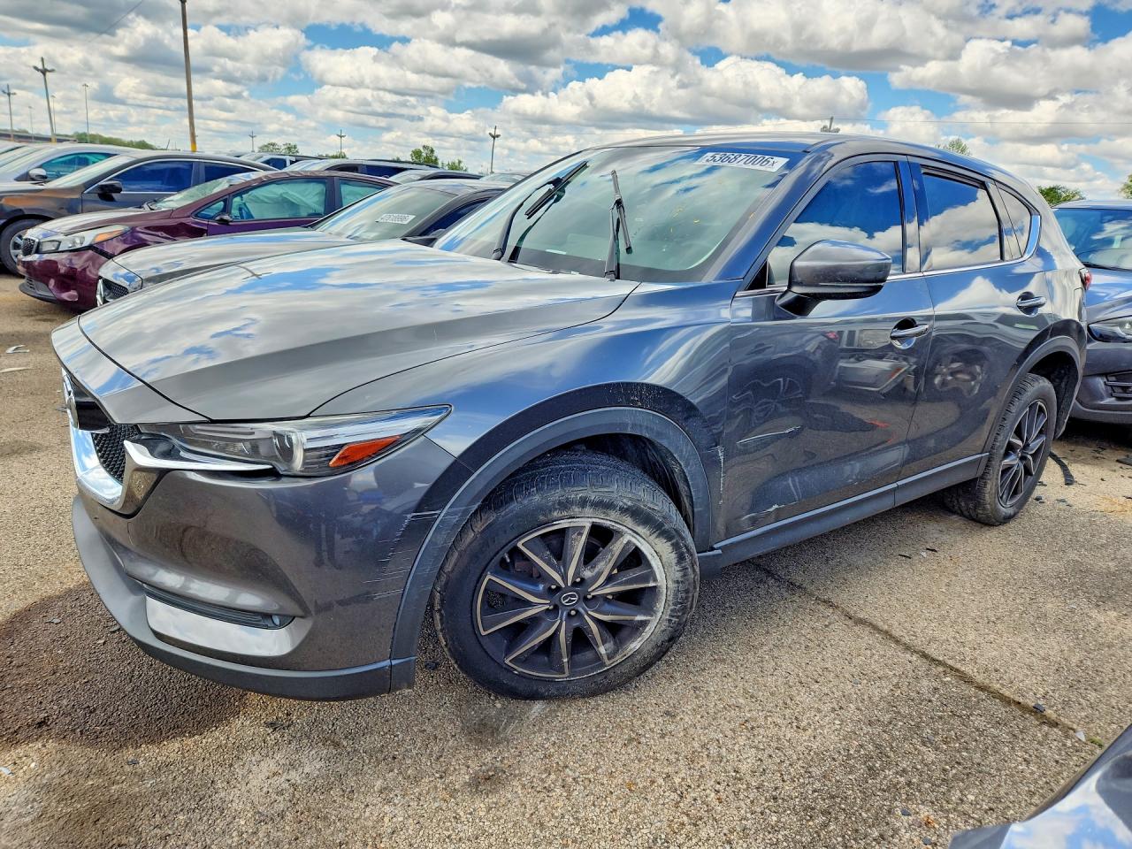 2017 Mazda CX-5 Grand Touring, VIN JM3KFBDL0H0205215 — Frame damage