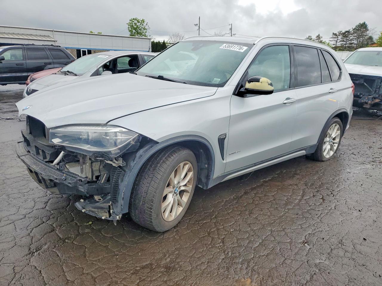 2015 BMW X5 xDrive50i, VIN 5UXKR6C50F0J74425 — Side