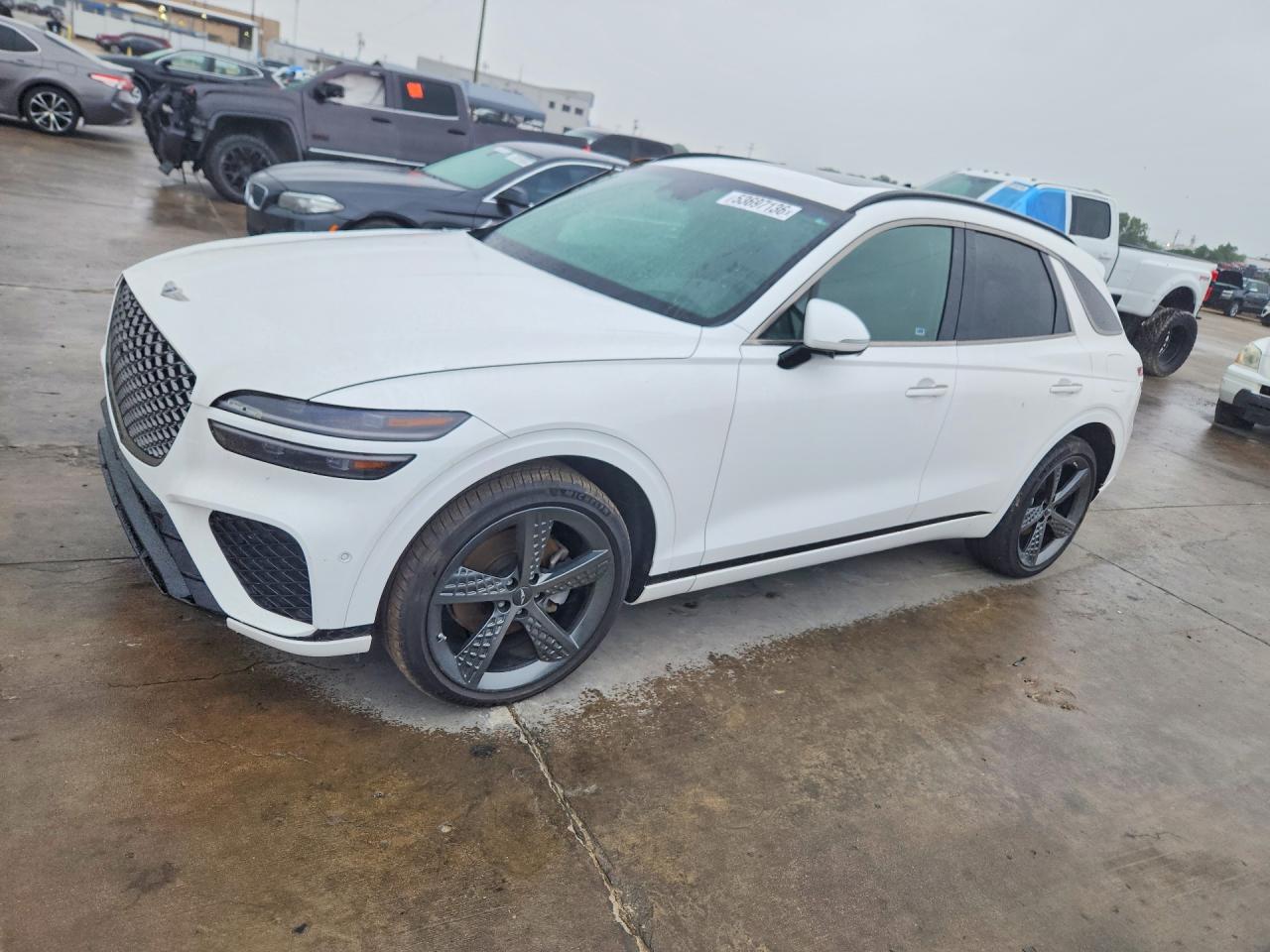 2022 Genesis GV70 2.5T, VIN KMUMADTB7NU050653 — Side