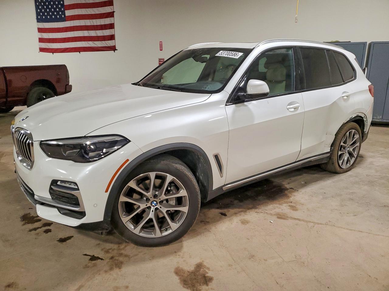 2020 BMW X5 xDrive40i, VIN 5UXCR6C02L9B81279 — Side