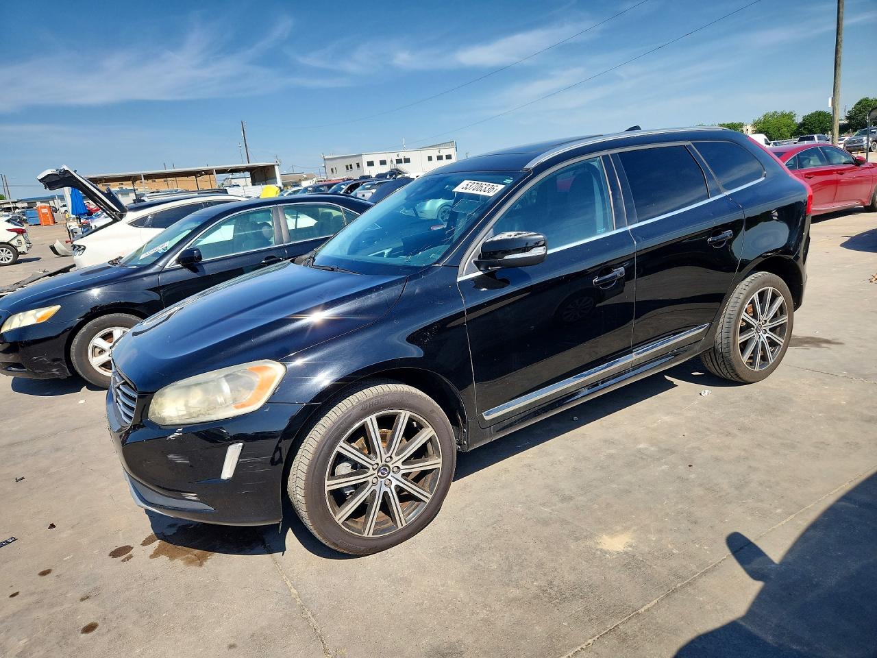 2015 Volvo XC60 T5 Drive-E Premier, VIN YV440MDK9F2697389 — Hail