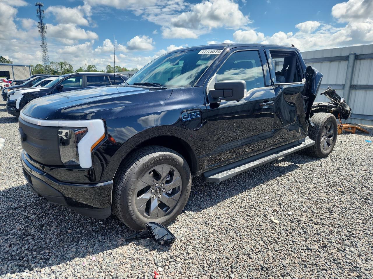 2025 Ford F-150 Lightning Flash, VIN 1FT6W3LU7SWG12947 — Rear end