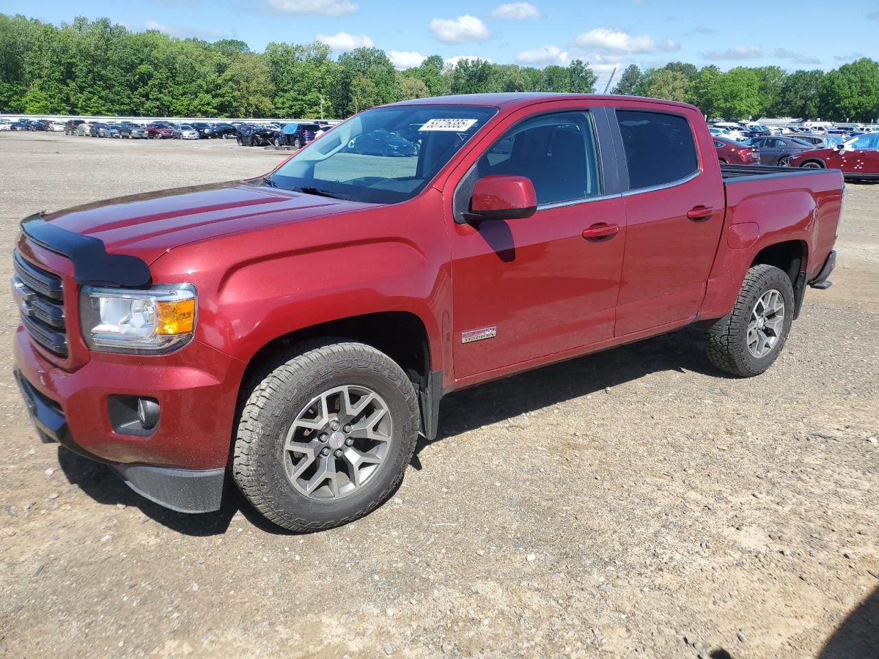 2020 GMC Canyon 4WD All Terrain, VIN 1GTG6FEN1L1166367 — Side