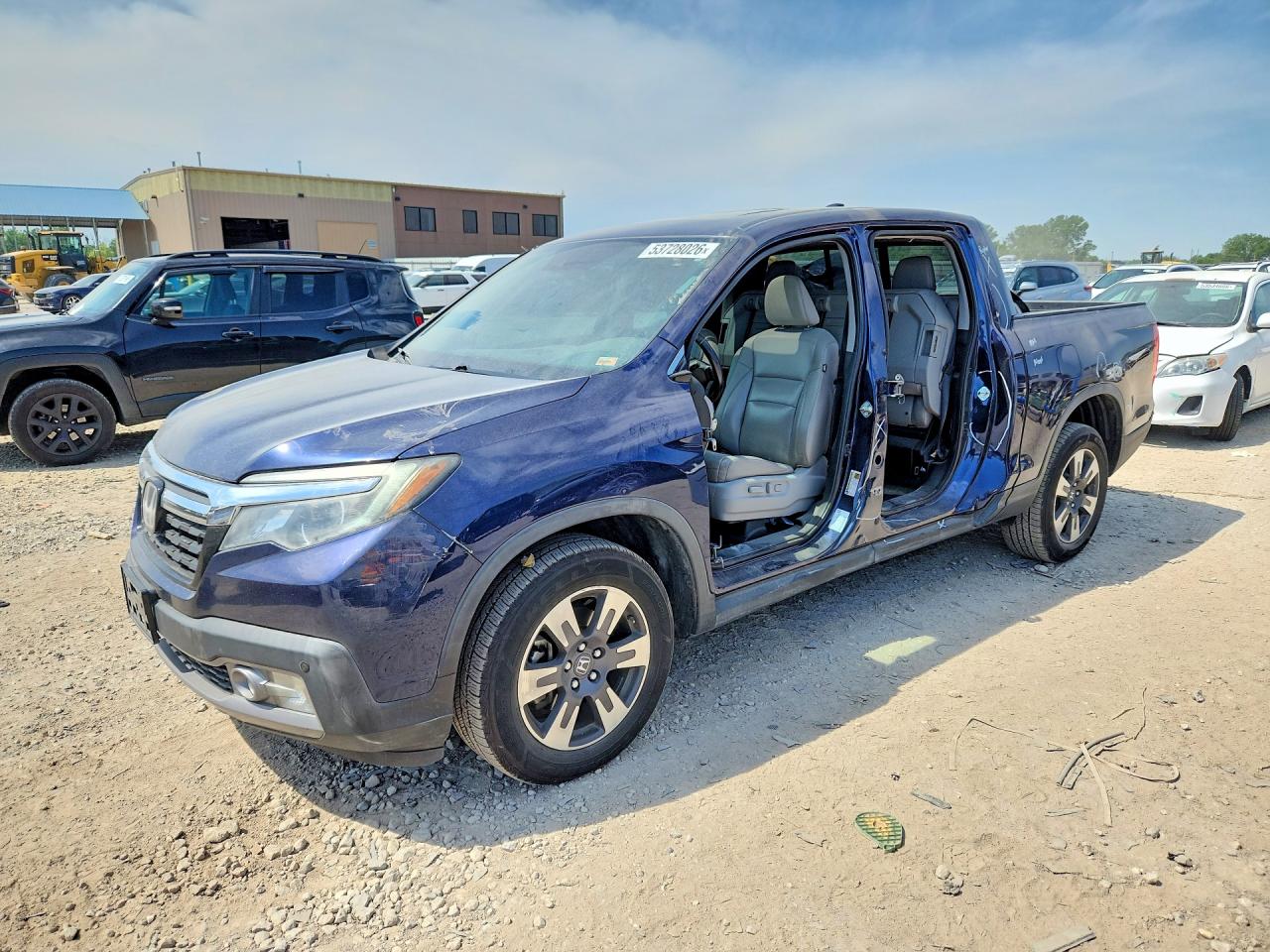 2018 Honda Ridgeline RTL-E, VIN 5FPYK3F74JB002217 — Side