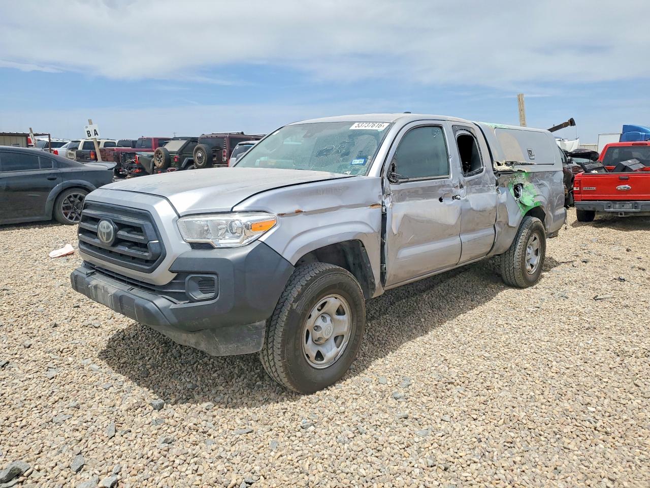 2021 Toyota Tacoma SR5, VIN 3TYRX5GN5MT027106 — Side