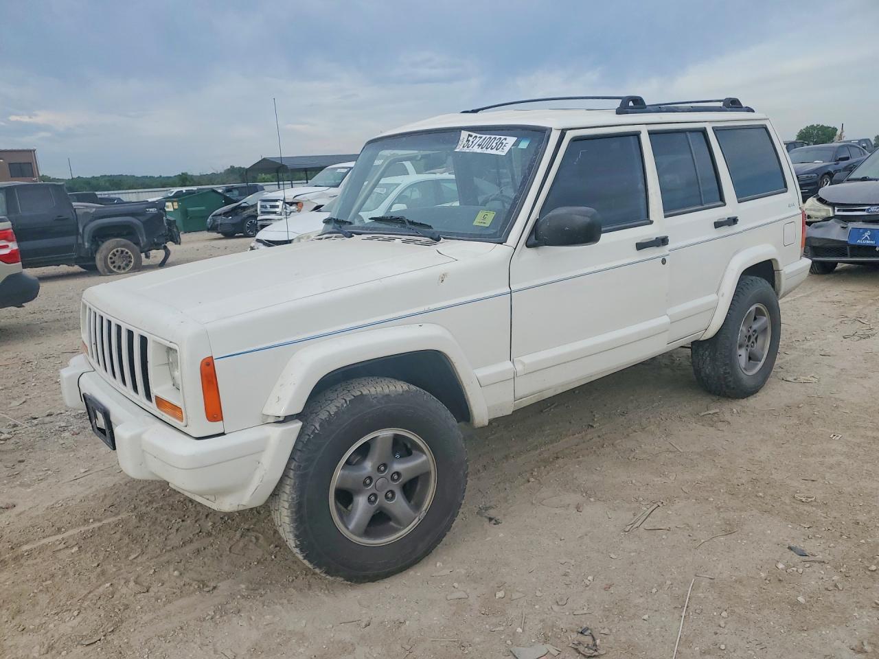 1999 Jeep Cherokee Sport, VIN 1J4FF68S9XL677827 — Side