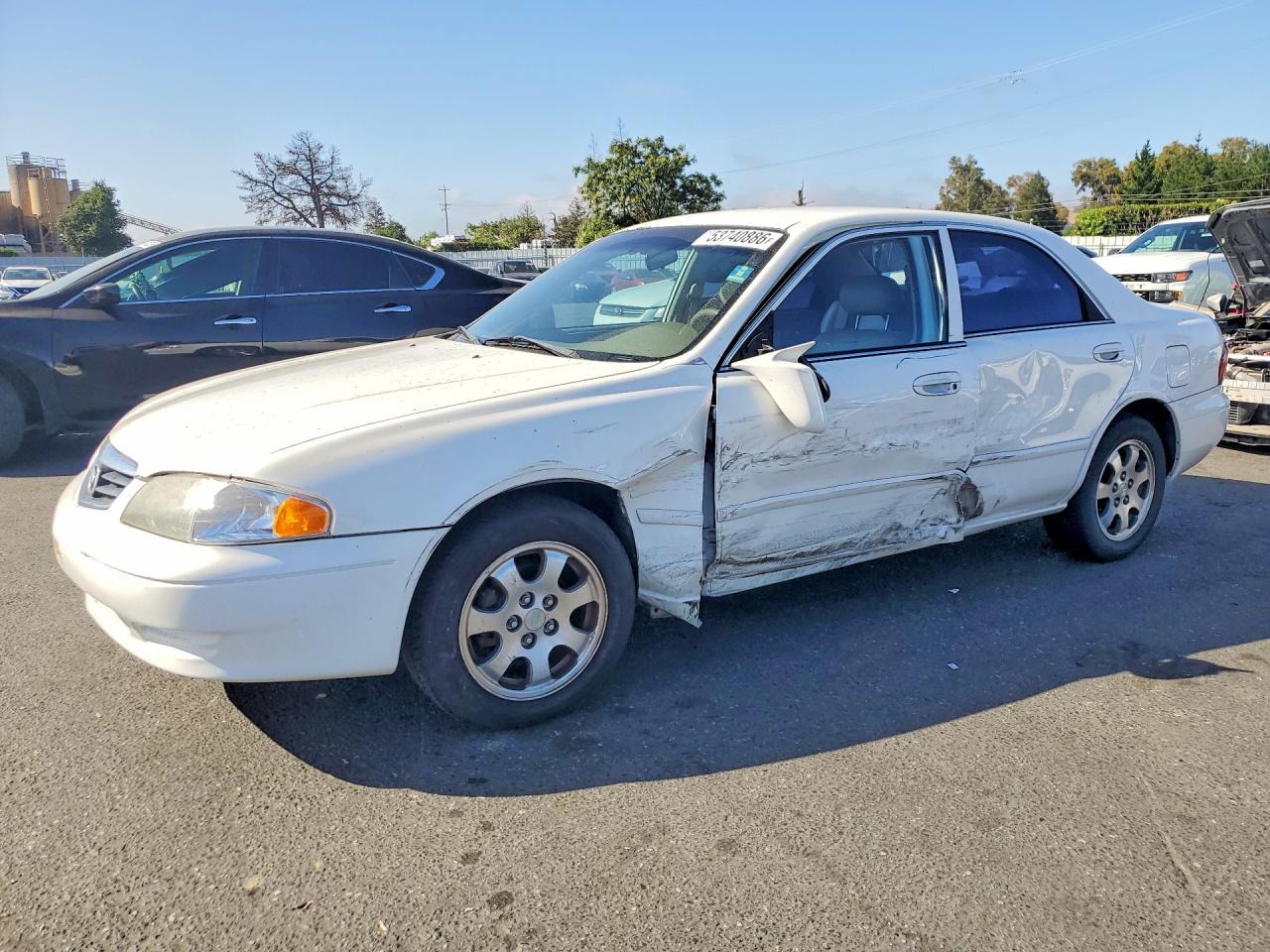 2000 Mazda 626 LX, VIN 1YVGF22C7Y5107104 — Front end