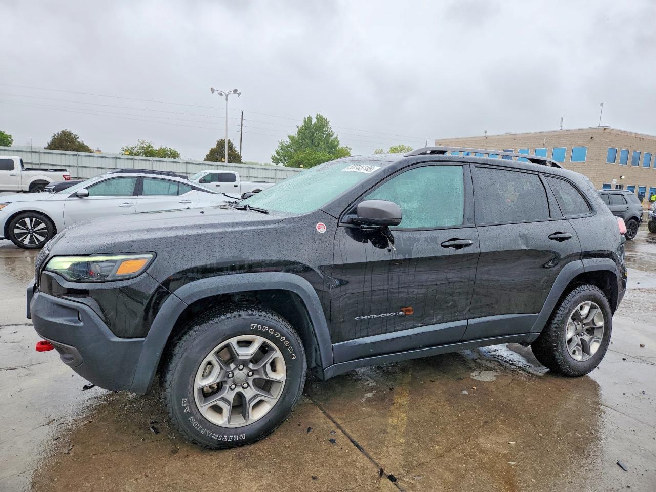 2019 Jeep Cherokee Trailhawk Elite, VIN 1C4PJMBN9KD380317 — Side