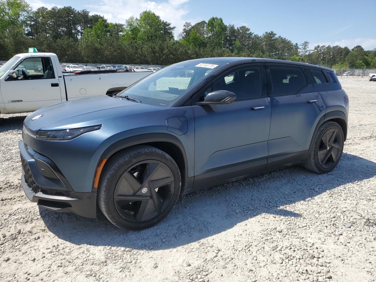 2023 Fisker Ocean One, VIN VCF1ZBU28PG002243 — Side