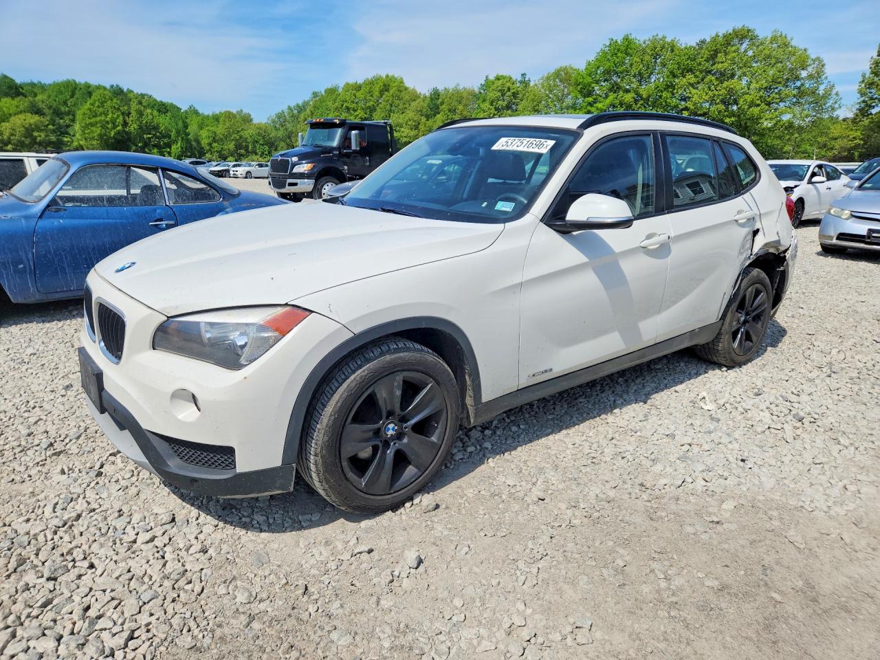 2013 BMW X1 xDrive28i, VIN WBAVL1C59DVR86337 — Rear end