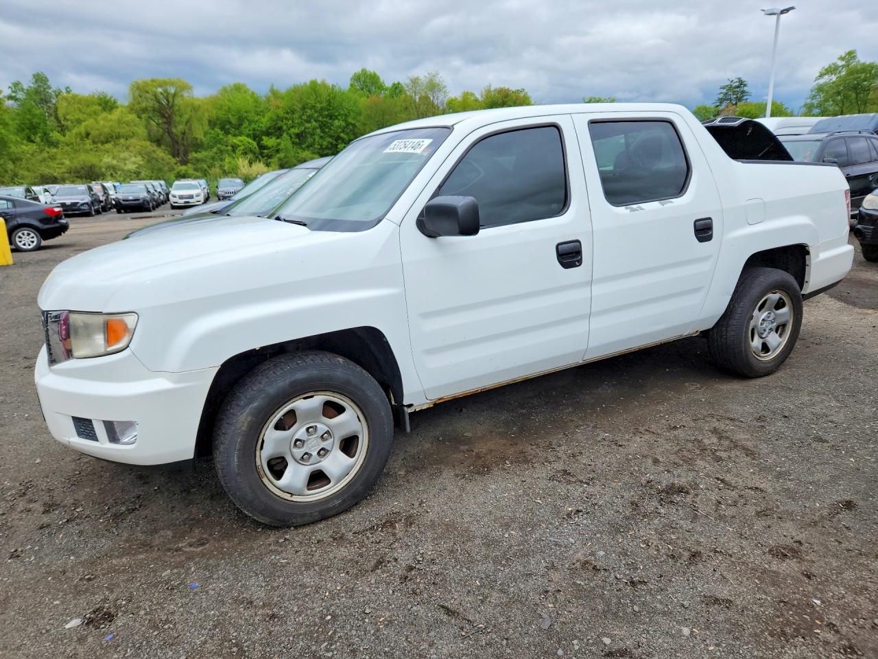 2009 Honda Ridgeline RT, VIN 5FPYK16219B102621 — Minor dents and scratches