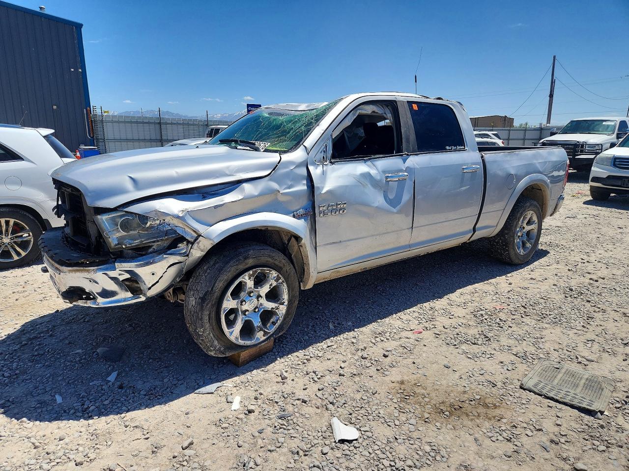 2016 Ram 1500 Laramie, VIN 1C6RR7VT4GS153026 — Rollover